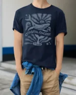 Coastal Energy Whale Graphic Tee Ocean Aesthetic Style - model wearing navy tee with hands in pockets