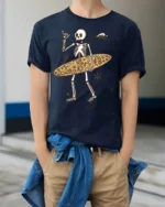 Funny Skeleton Surfer Graphic Tee Beach Humor Summer Style - model wearing navy tee with hands in pockets