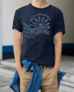 Ocean Lover Whale Graphic Tee Sea Life Aesthetic Style - model wearing navy tee with hands in pockets