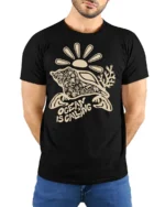 Ocean Is Calling Sea Turtle Graphic Tee Coastal Travel Mood - model wearing black tee with hands behind back