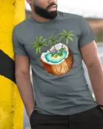 Tropical Coconut Island Graphic Tee Summer Vacation Mood - model wearing grey tee, leaning on column