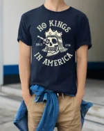 No Kings In America Skull Graphic Tee Patriotic Vintage Tshirt - model wearing navy tee with hands in pockets