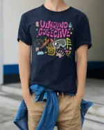 Unbound Collective Adventure Graphic Tee Outdoor Fun Tshirt - model wearing navy tee with hands in pockets