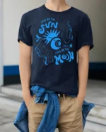 Live By The Sun Love By The Moon Graphic Tee Cosmic Tshirt - model wearing navy tee with hands in pockets
