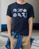 Cute Ocean Creatures Graphic Tee Minimal Marine Life Tshirt - model wearing navy tee with hands in pockets
