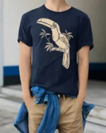 Tropical Toucan Bird Graphic Tee Minimal Jungle Nature Tshirt - model wearing navy tee with hands in pockets