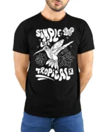 Simple Life Tropical Hummingbird Graphic Tee Freedom Vibes - model wearing black tee with hands behind back