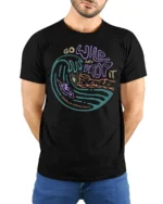 Go Wild And Drop It Surf Graphic Tee Retro Ocean Wave Tshirt - model wearing black tee with hands behind back