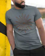 Tribal Sun Symbol Graphic Tee Spiritual Energy Vintage Style - model wearing grey tee, leaning on column