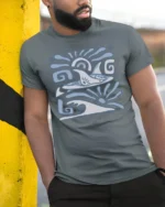 Retro Dolphin Wave Graphic Tee Ocean Tribal Style Tshirt - model wearing grey tee, leaning on column
