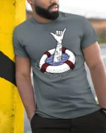 Shaka Hand Lifebuoy Graphic Tee Beach Vibes Funny Tshirt - model wearing grey tee, leaning on column