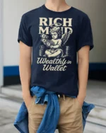 Rich Mind Wealthy Wallet Angel Money Vintage Graphic Tee - model wearing navy tee with hands in pockets