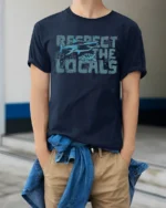 Respect The Locals Shark Turtle Ocean Graphic Tee - model wearing navy tee with hands in pockets
