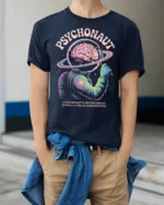 Psychonaut Cosmic Mind Explorer Astronaut Graphic Tee - model wearing navy tee with hands in pockets