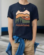 Life Is Better In The Mountains Vintage Nature Graphic Tee - model wearing navy tee with hands in pockets