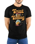 Trust The Timing Retro Hourglass Motivational Graphic Tee - model wearing black tee with hands behind back