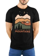 Life Is Better In The Mountains Vintage Nature Graphic Tee - model wearing black tee with hands behind back