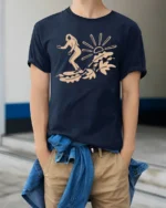 Minimal Surfing Girl Wave Sunset Beach Vibe Graphic Tee Cool Tshirt - model wearing navy tee with hands in pockets