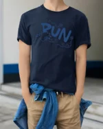 Run Club Playful Cartoon Style Graphic Tee Fun Active Vibes Tshirt - model wearing navy tee with hands in pockets