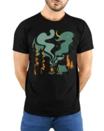 Campfire Night Sky Adventure Tee Cozy Outdoor Camping Vibes Tshirt - model wearing black tee with hands behind back