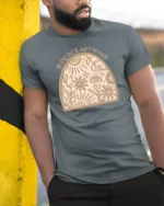 Peace Within Boho Spiritual Sun Flower Art Tee Calm Aesthetic Tshirt - model wearing grey tee, leaning on column