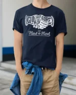Glory And Gore Go Hand In Hand Vintage Handshake Graphic Tee Tshirt - model wearing navy tee with hands in pockets
