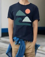 Minimal Ocean Wave Mountain Sun Abstract Art Graphic Tee Tshirt - model wearing navy tee with hands in pockets