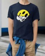 Edgy Skull With Smile Helmet Graphic Tee Tshirt Urban Vibes - model wearing navy tee with hands in pockets