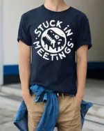 Stuck In Meetings Funny Office Humor Melting Face Tee Tshirt - model wearing navy tee with hands in pockets