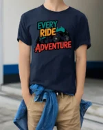 Every Ride Is A New Adventure Cycling Mountain Graphic Tee Tshirt - model wearing navy tee with hands in pockets