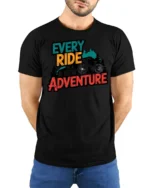 Every Ride Is A New Adventure Cycling Mountain Graphic Tee Tshirt - model wearing black tee with hands behind back