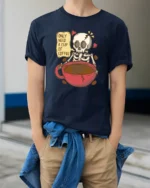 Only Need A Cup Of Coffee Skeleton Graphic T Shirt Funny Tee - model wearing navy tee with hands in pockets