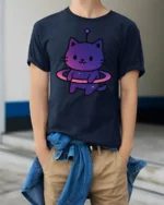 Cute Space Cat Alien Graphic T Shirt Kawaii Cosmic Tee - model wearing navy tee with hands in pockets