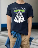 Get In Loser Alien UFO Graphic T Shirt Funny Space Tee - model wearing navy tee with hands in pockets
