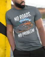 No Roads No Problem Off Road Truck Graphic T Shirt Tee - model wearing grey tee, leaning on column
