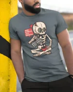 More Espresso Less Depresso Skeleton Coffee T Shirt Tee - model wearing grey tee, leaning on column