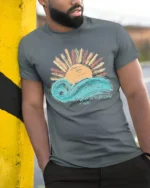 Take Me To The Ocean Wave Sunset Graphic T Shirt Tee - model wearing grey tee, leaning on column