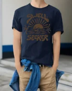 Swell Seeker Retro Surf Sunset Graphic Tee Beach Vibe Tshirt - model wearing navy tee with hands in pockets