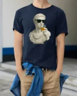 Funny Classical Statue Drinking Whiskey Cool Sunglasses T Shirt - model wearing navy tee with hands in pockets