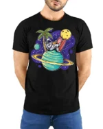 Funny Astronaut Surfing Planet Space Beach Vibes T Shirt - model wearing black tee with hands behind back