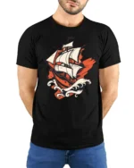 Vintage Sailing Ship Ocean Adventure Bold Graphic T Shirt - model wearing black tee with hands behind back