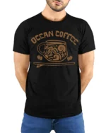 Ocean Coffee Beach Vibes Cute Coastal Lover Graphic T Shirt - model wearing black tee with hands behind back