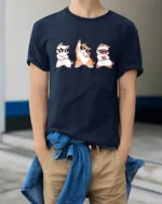 Funny Dancing Cats With Sunglasses Cute Cartoon T Shirt - model wearing navy tee with hands in pockets