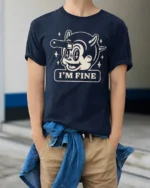 Funny Im Fine Cartoon Dog Dark Humor Graphic T Shirt - model wearing navy tee with hands in pockets