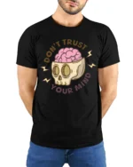 Dont Trust Your Mind Funny Skull Brain Graphic T Shirt - model wearing black tee with hands behind back