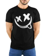 Edgy Smiley Face X Eyes Tongue Out Cool Graphic Tee - model wearing black tee with hands behind back