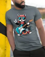 Rock Star Cat Playing Guitar Cool Cartoon Graphic T Shirt - model wearing grey tee, leaning on column