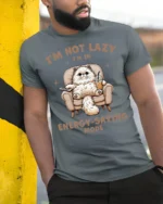 Im Not Lazy Im In Energy Saving Mode Funny Cat T Shirt - model wearing grey tee, leaning on column