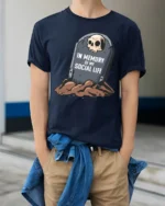In Memory Of My Social Life Funny Tombstone Graphic T Shirt - model wearing navy tee with hands in pockets