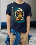 Cool Astronaut Gorilla Space Ape Retro Graphic T Shirt - model wearing navy tee with hands in pockets